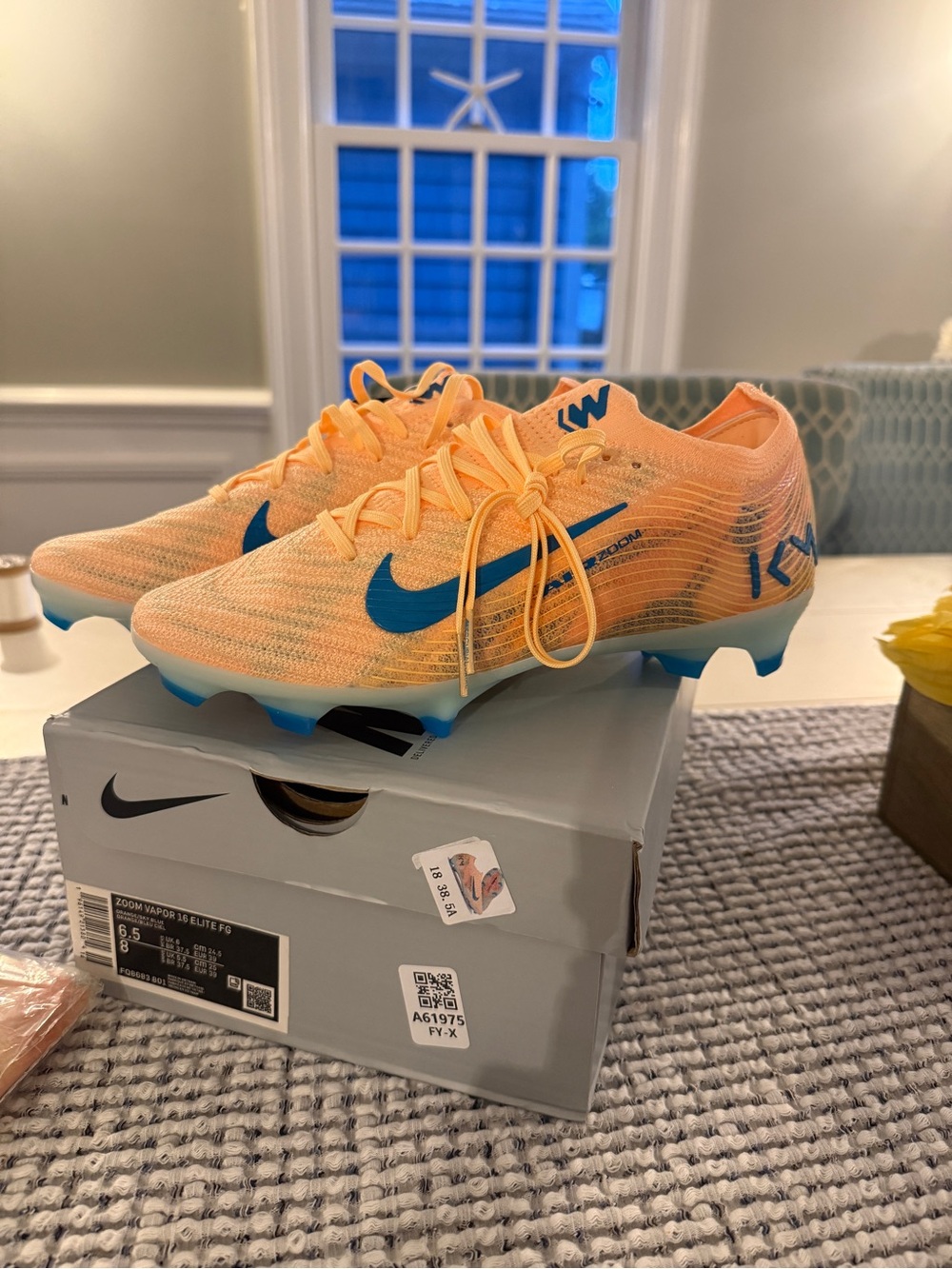 Nike Zoom Vapor 16 Elite Orange Soccer Cleats with Blue Swoosh